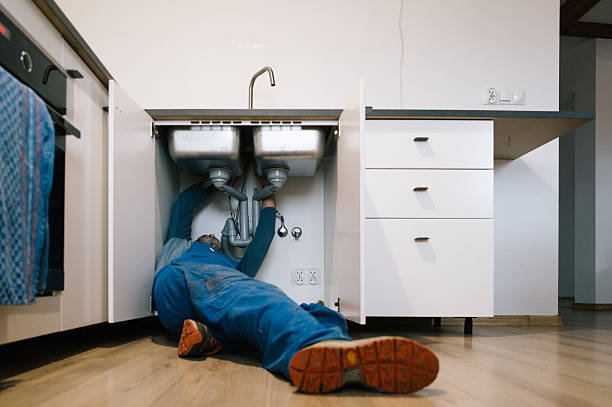 Professional Drain Cleaning technician working in Carthage, IL